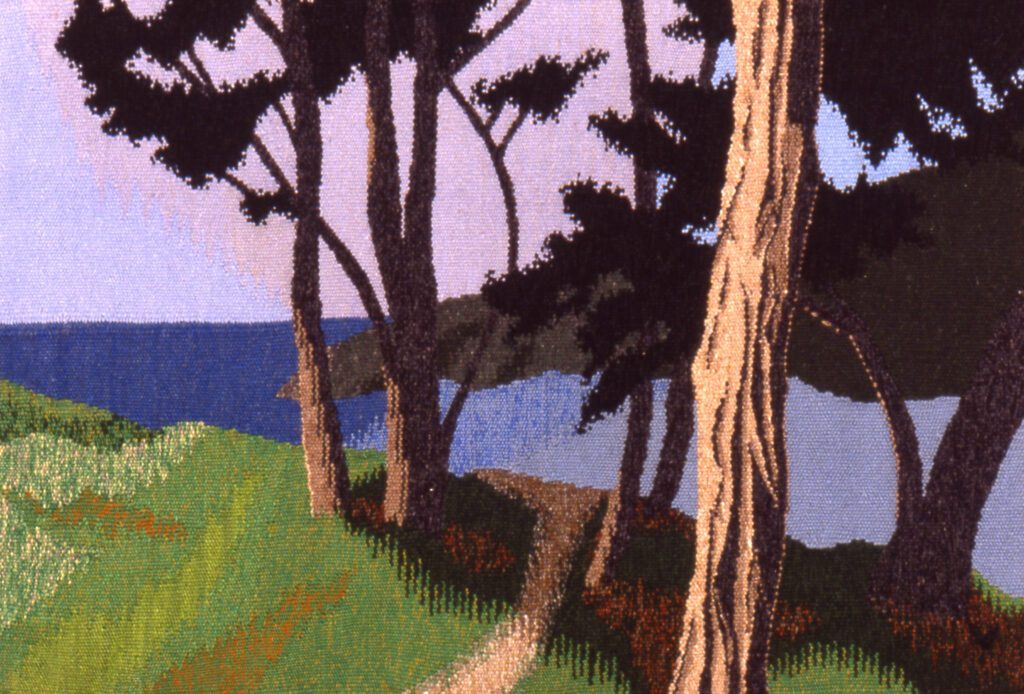 A close-up view of a tapestry designed by Victor Thomas Jacoby.