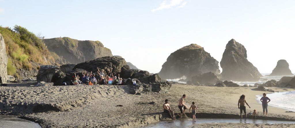 Beachgoers soak up sunny day at Luffenholtz Beach.