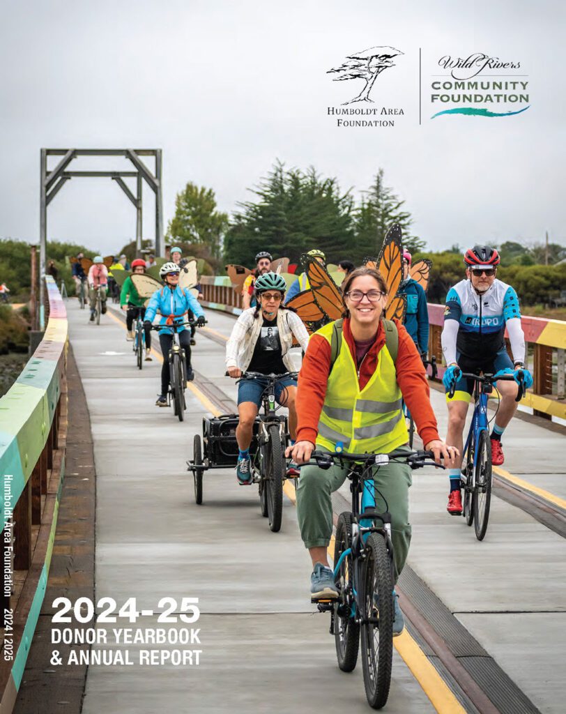 Cover of the '24-'25 donor yearbook featuring a group of people riding bicycles on the Humboldt Bay Trail.